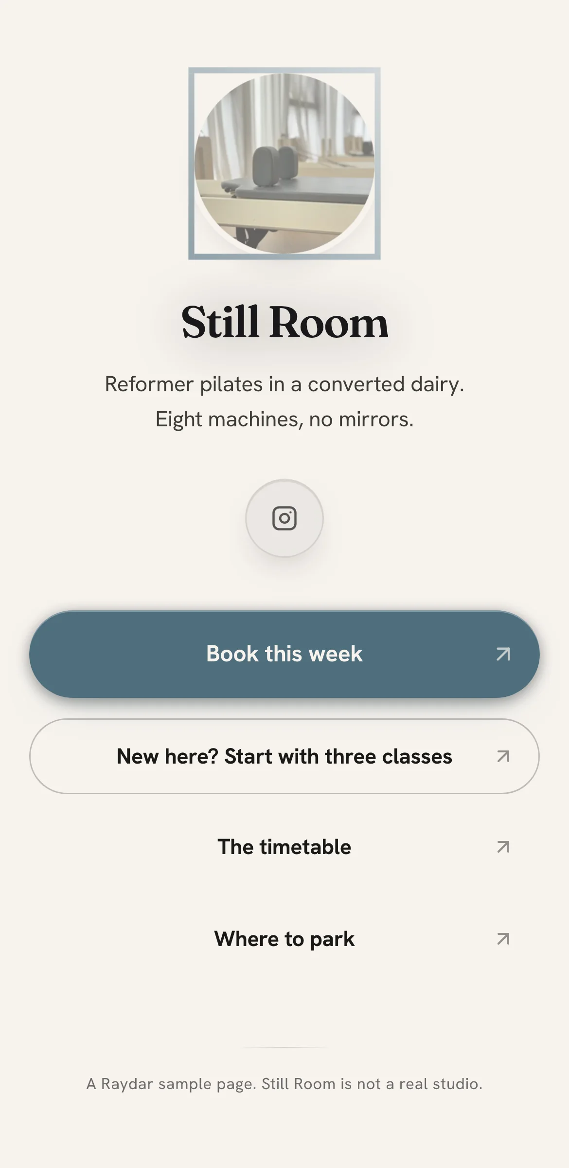 Example link in bio page for a fictional pilates studio, Still Room: off-white page, studio photo, slate teal Book this week button and three more links.
